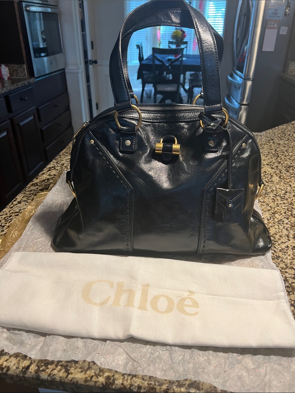 Yves Saint Laurent Black Shoulder Bag with Gold Accents